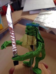 Adolescent Metamorphed Samurai Reptile.  Reptile, Headband, and Sword each folded from one uncut square.